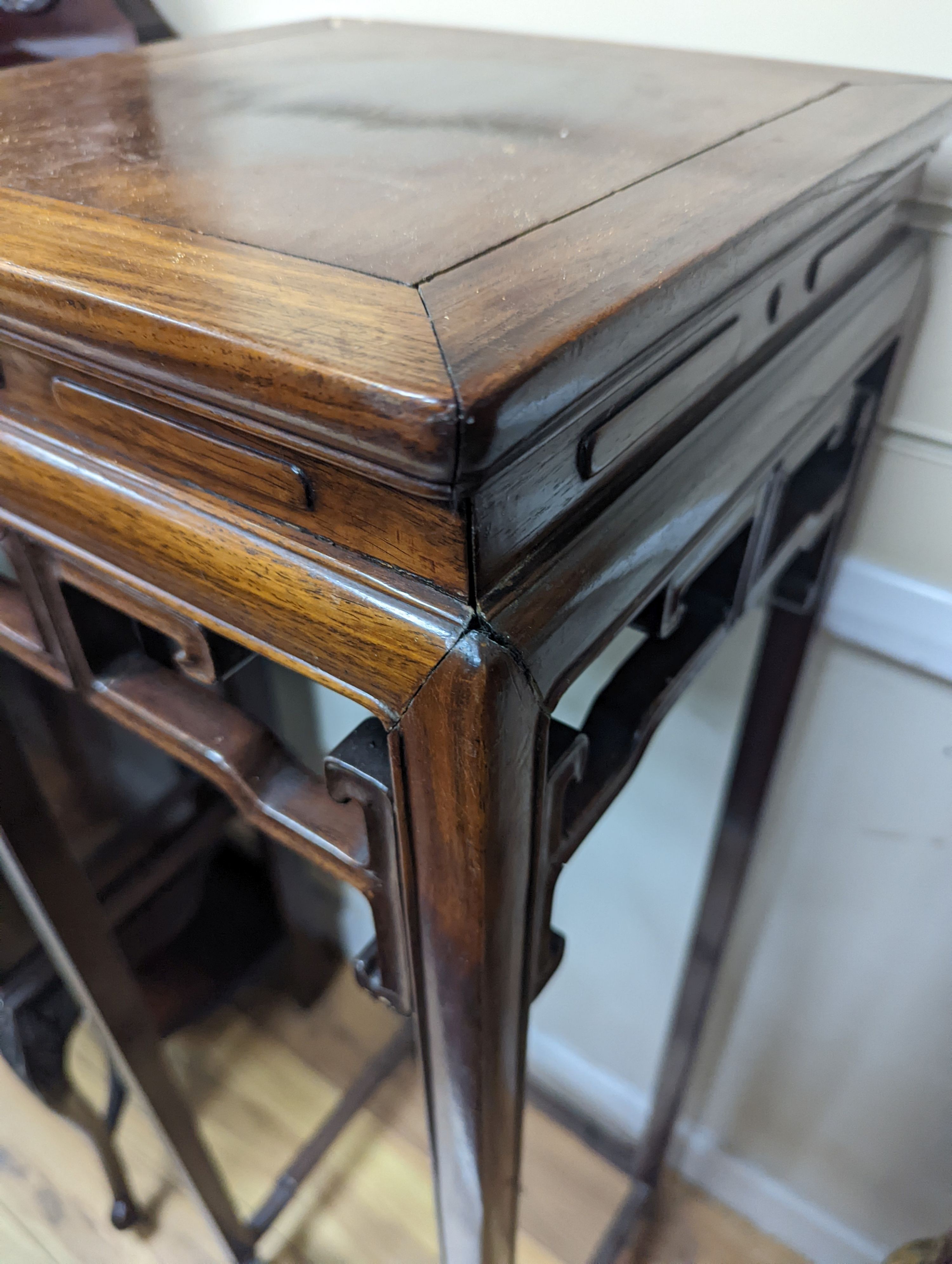 A Chinese carved hardwood vase stand, width 32cm, depth 33cm, height 110cm